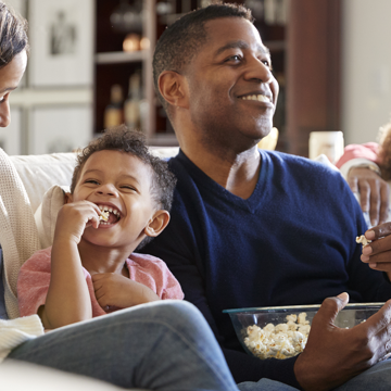 Family Watching A Movie At Home Gettyimages 1126139104